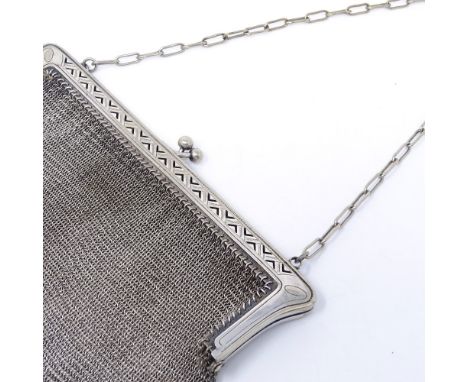 A silver plated mesh evening purse, with pierced arrow mounts, width 17cm 