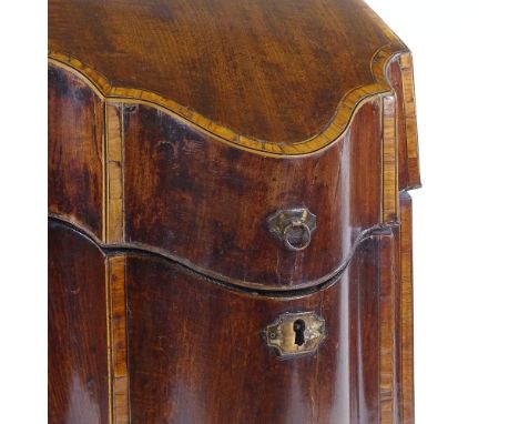 A George III mahogany and tulip wood crossbanded knife box, with shaped front and ogee bracket feet, width 22cm 