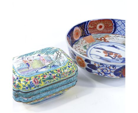 A Japanese porcelain blue red and gilt decorated bowl on foot, diameter 25cm, and a Chinese enamel box, length 15cm (2) 