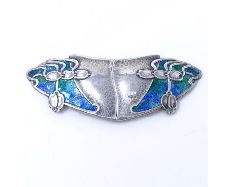 An Edwardian silver and peacock enamel belt buckle, of lobed form with planished finish, by Liberty &amp; Co, hallmarks Birmi