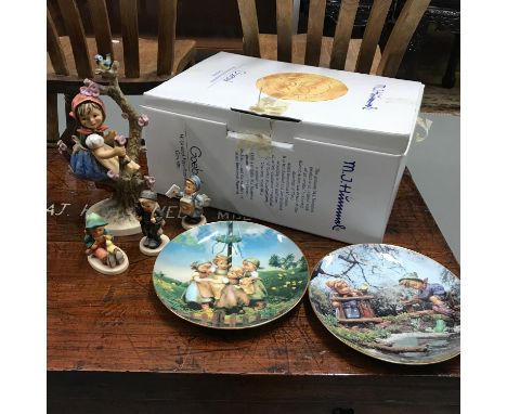 A Selection of Goebel Hummel Figurines, Large apple tree girl, 3 Boy Hummel figures and two collectors plates, Girl comes wit