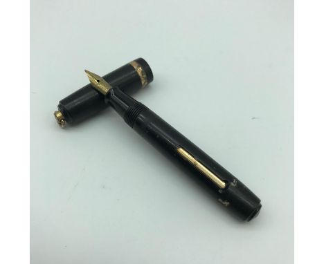A Small Golden Arrow fountain pen, Fitted with a 14ct gold nib. 