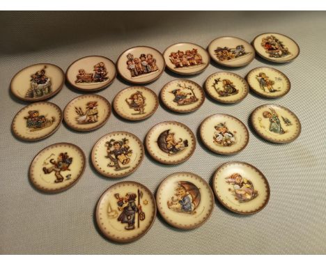 A collection of Goebel plates 