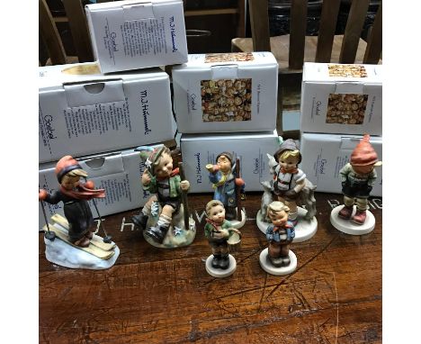 A Lot of 7 Goebel Hummel figurines, Scamp, Mountaineer, Skier, Herder, Hear ye- Hear ye, Village boy &amp; March winds. All w