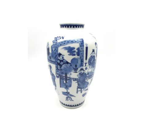 An early 20th century Chinese Kangxi Nian Zhi 'Kangxi Period Mark' two section blue and white hand painted vase, Measures 21c