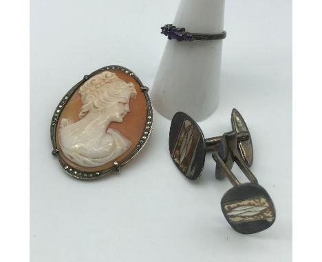 An Edinburgh silver ladies ring set with three genuine Amethyst stones, Silver cameo brooch set with Marcasite stones &amp; a