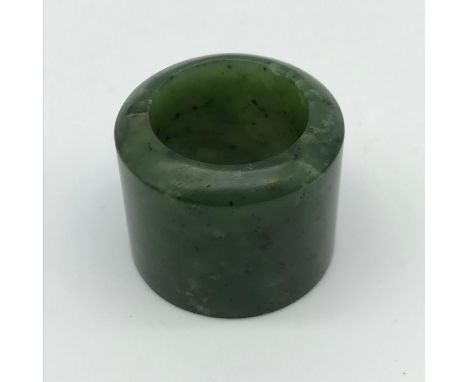 Antique green jade archers ring. 