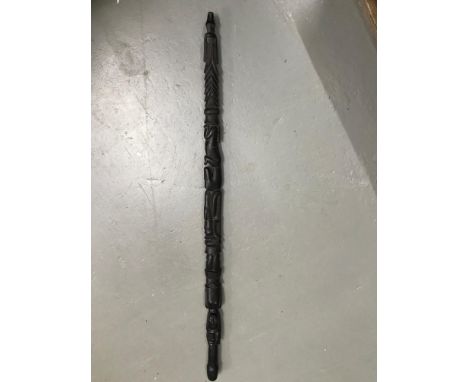 An Ebony African carved totem style walking stick. Measures 80cm in length 