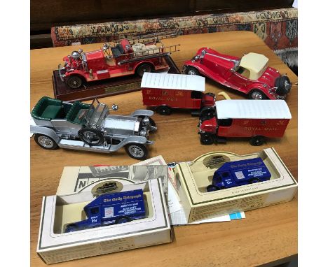 A Lot of three Franklin Mint car models, 1907 silver Rolls Royce Silver Ghost, Mercedes Benz &amp;1922 Ahrens Fox fire engine