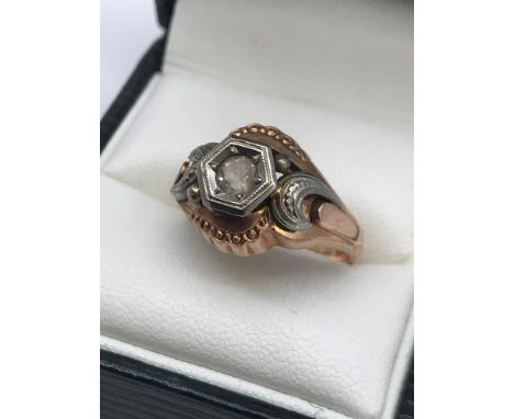 An Antique gold and white metal gents ring, designed with a single clear stone, Ring size P, Stamped 500, LP, 9VI. Weighs 3.6