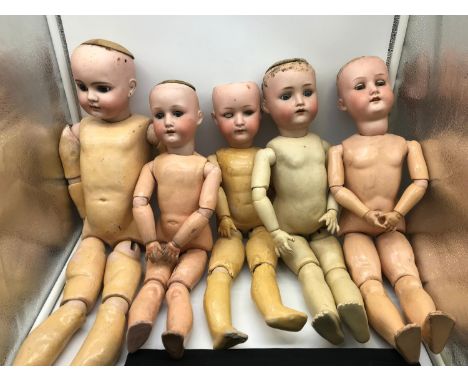 A Lot of 5 antique bisque head German dolls, All have jointed limbs, Three are made by Heubach Keppelsdorf. 