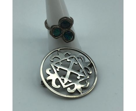 An Ortak silversmith silver brooch together with an 835 silver ladies ring set with 3 opal stones. Ring size p. 