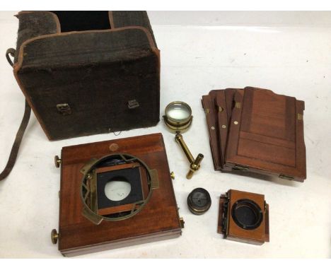 Cased brass and mahogany field camera, no name with double darkslides, lens and accessories