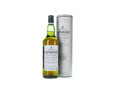 LAPHROAIG TRIPLE WOOD - ONE LITRE Single Malt Scotch Whisky Matured in ex-bourbon, quarter and European oak casks. One litre,