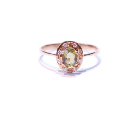 Diamond and tourmaline oval cluster ring with eight small brilliants, in gold, '14k', size N, 1.5g. 