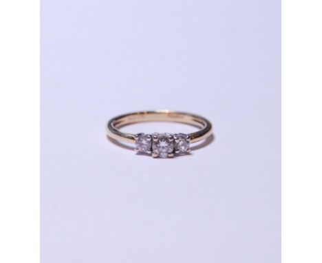 18ct gold three-stone diamond ring set with three graduated brilliants, measuring approximately .5ct in total, stamped '750',