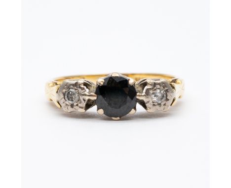 An 18ct yellow gold sapphire + diamond ring,
3.3 grams in weight approx,
size L,
vintage