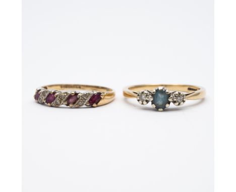 2x 9ct yellow gold dress rings,
a blue topaz is a size P,
ruby and diamond is a P,
4 grams combined weight approx