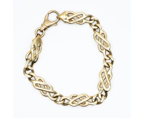 A 9ct yellow gold solid linked celtic bracelet,
7 inches long and 10mm wide approx,
each link is solid gold,
22.4 grams in we