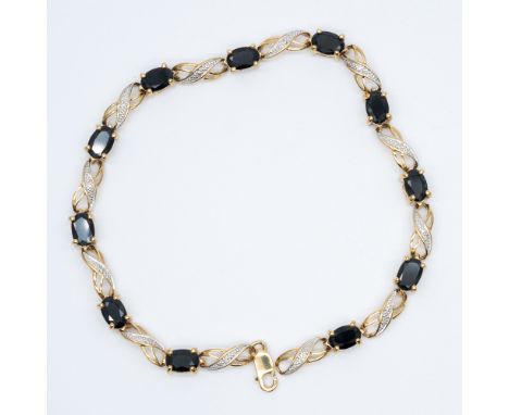 A 9ct yellow gold sapphire and diamond bracelet,
7 1/2 inches long,
6.6 grams in weight approx