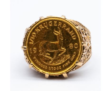 A Krugerrand 1980 1 10th of an ounce gold ring,
7.4 grams total weight approx including the shank and the coin,
size M