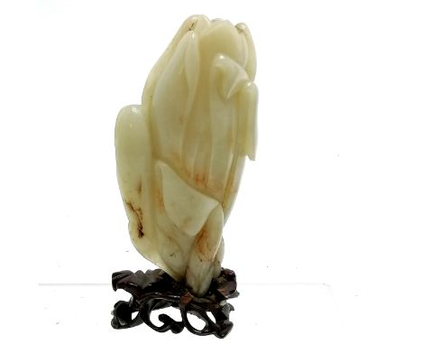 Hand carved oriental Chinese jade flower head on hand carved wooden base (14cm total height) - base and top of carving slight