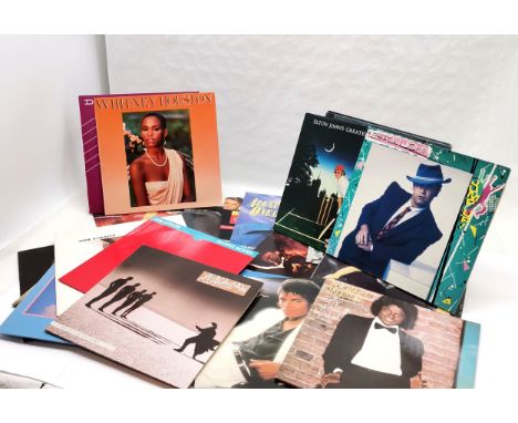 Qty of 1970/80s Vinyls to include 2 x Michael Jackson, 4 x Elton John, 4 x Dire Straits, Jellybean, etc. All covers appear to