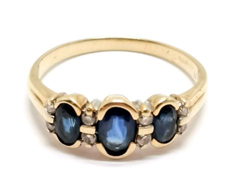 9ct marked gold sapphire (3) and diamond (8) ring in rub over mount ~ size Q &amp; 2.3g total weight 
