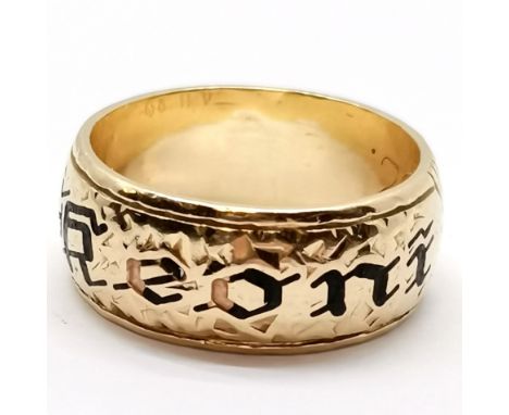 Unmarked gold (touch tests as 14ct) Hawaiian wide band ring decorated with enamel &amp; chased engraving 'Keoni' (God is Grac