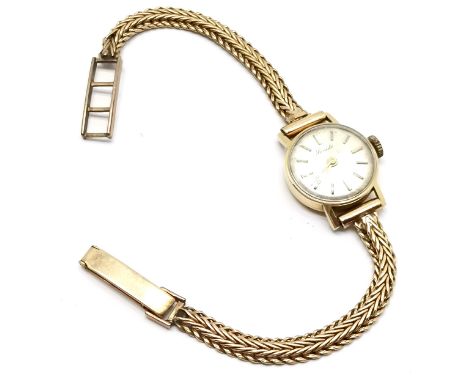 14ct marked gold Senate ladies manual wind wristwatch on a 9ct hallmarked gold bracelet - total weight 10.5g ~ running BUT WE