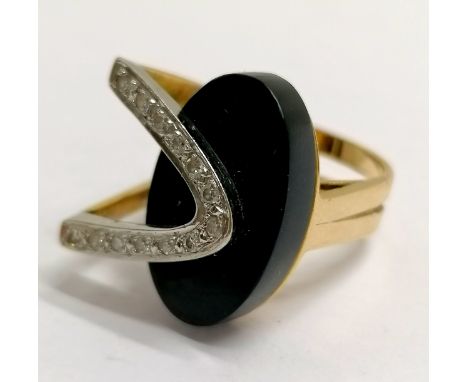Unmarked gold (touch tests as 14ct) diamond &amp; onyx designer ring - size N &amp; 10.2g total weight 
