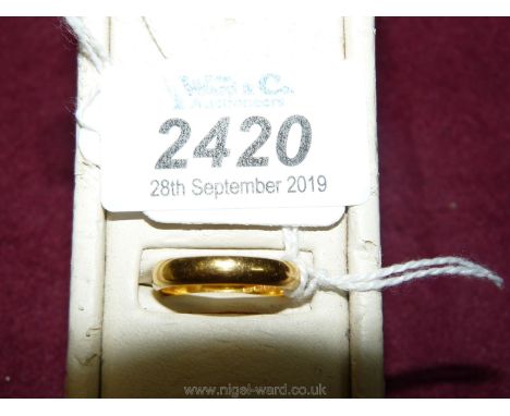 A 22 ct. gold hallmarked wedding band, 5 gms approx. ring size "Q" approx.