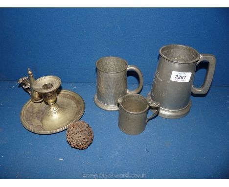 A quantity of Pewter including two tankards, chamber stick and small jug.