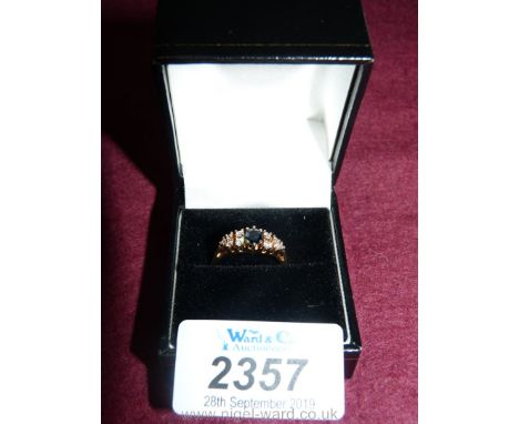 An 18ct sapphire and diamond Ring, hallmarked.