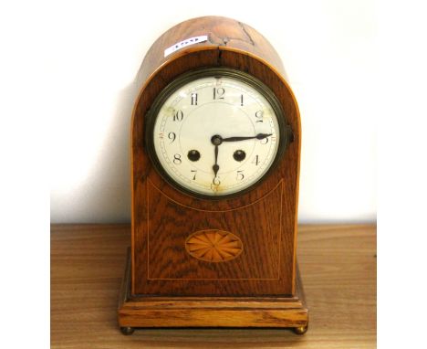 An inlaid oak mantle clock, H. 26cm.