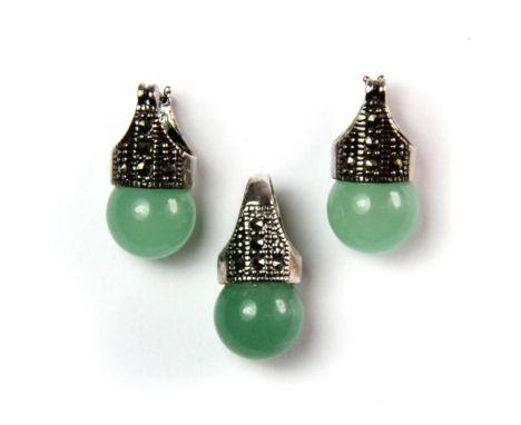 A pair of 925 silver and marcasite mounted polished jade earrings and matching pendant.