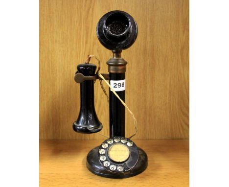 An early stick telephone, H. 33cm.