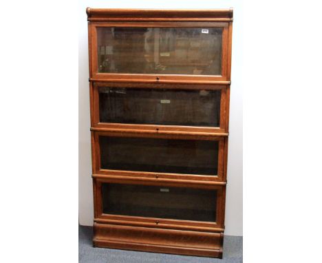 A Globe-Wernicke oak glazed bookcase, 87 x 31 x 156cm.