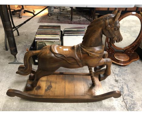 A GOOD QUALITY SOLID WOODEN CHILDREN'S ROCKING HORSE MODEL 