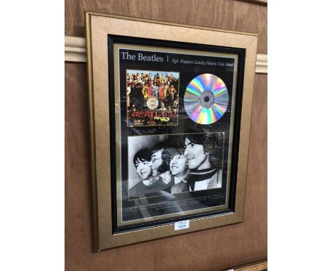 A FRAMED 'THE BEATLES' SGT PEPPERS CD 