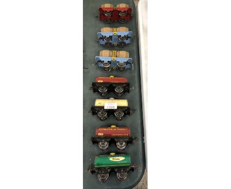 SEVEN ASSORTED VINTAGE TINPLATE MODEL RAILWAY TANKERS 