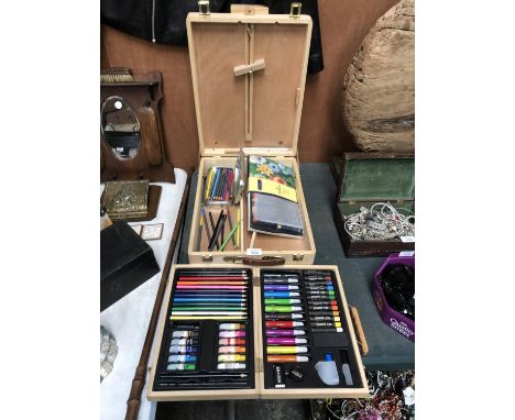 A WOODEN ARTISTS EASEL BOX AND FURTHER BOX OF ART SUPPLIES (QTY) 