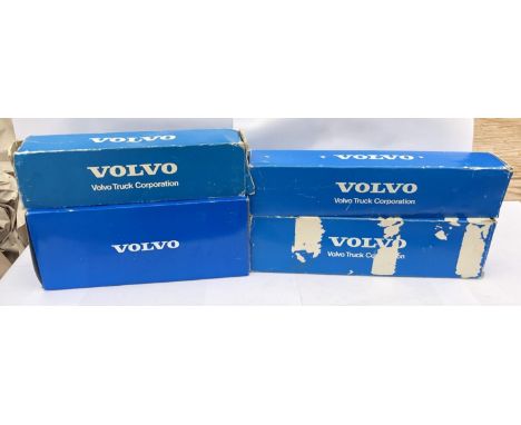 FOUR BOXED VOLVO DIE CAST MODELS - FL10 TANKER WITH TRAILER 280338, FL7 SEMITRAILER TRACTOR 280339, F7 FUEL TANKER 280523 AND