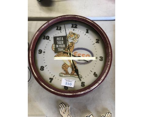 AN 'ESSO' TIGER CIRCULAR WALL CLOCK 