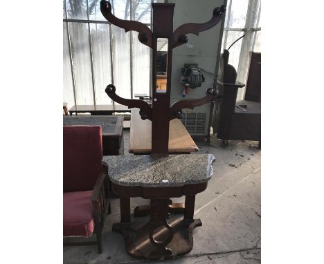 A VICTORIAN MAHOGANY HALL STAND WITH MARBLE SHELF AND CENTRE MIRROR 