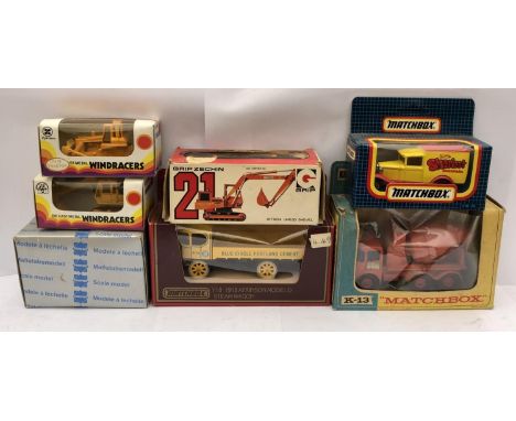 SEVEN BOXED DIE CAST MODELS TO INCLUDE 'MATCHBOX' K-13 CEMENT MIXER, 'WINDRACERS' ETC 