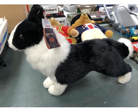 A 'MERRYTHOUGHT' SOFT TOY DOG MODEL 