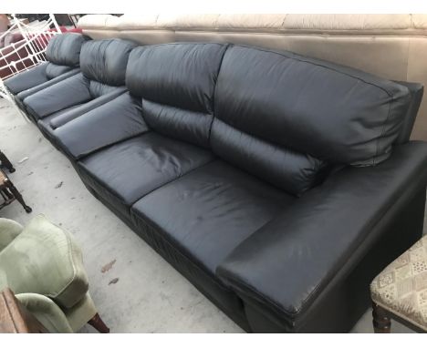 A BLACK LEATHER TWO SEATER SOFA AND TWO ARMCHAIRS 