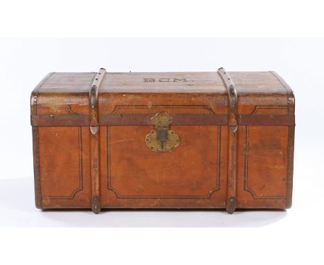 Early 20th Century trunk, the strapped leather trunk with stud work forming the initials BCM, 85cm wide