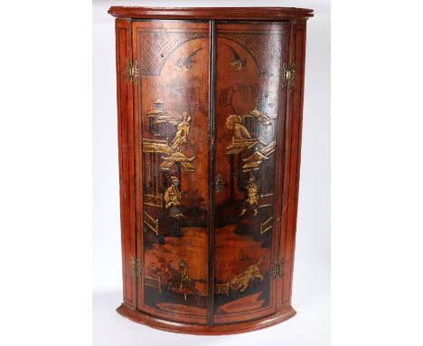 George III red lacquered hanging corner cabinet, the bow fronted cabinet with red lacquer and pagodas over a river, restorati